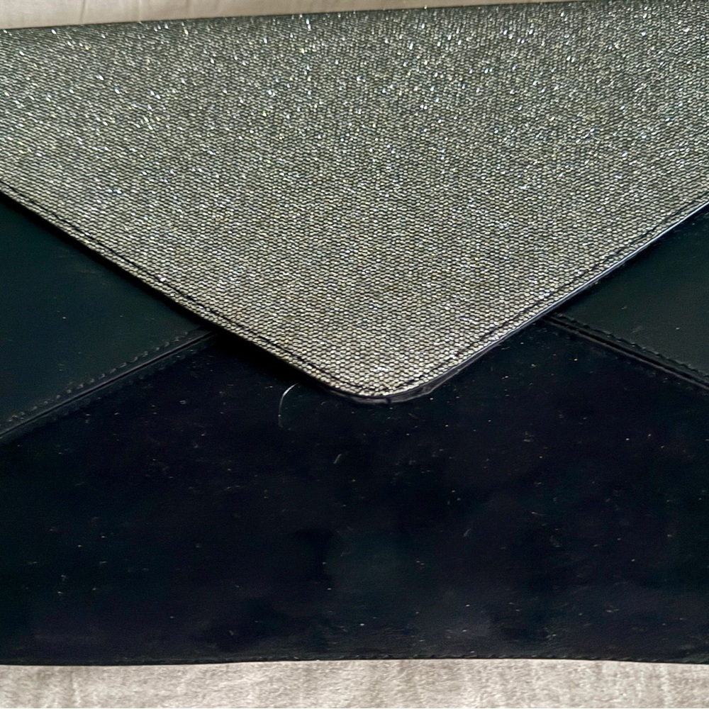 DSW Black and Silver Clutch 11" wide x 7" long x 1/2" d.